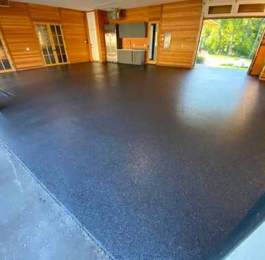 garage with blue garage epoxy floor coating